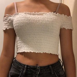 H&M white off-shoulder crop top.